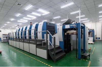 Commercial printing press inside a partner factory